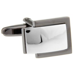 Mansetinööbid - hõbedane plaat tumedal taustal